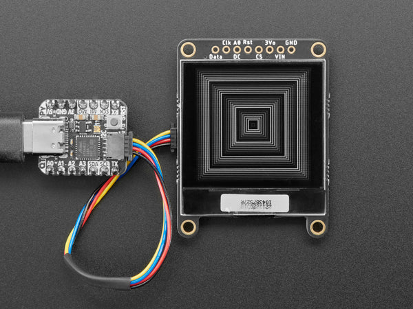 Grayscale OLED display showing concentric squares