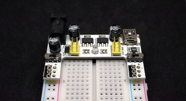 Top view of breadboard with power board fitted so that all holes are accessible